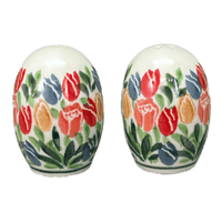 A picture of a Polish Pottery Small Salt & Pepper Set (Tulip Burst) | A735S-U4226 as shown at PolishPotteryOutlet.com/products/small-salt-pepper-set-tulip-burst-a735s-u4226