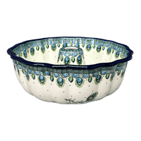 A picture of a Polish Pottery CA Bundt Cake Pan (Peacock Plume) | AA55-2218X as shown at PolishPotteryOutlet.com/products/bundt-cake-pan-peacock-plume-aa55-2218x