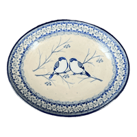 A picture of a Polish Pottery CA 10.25" Oval Dish (Bullfinch on Blue) | AC93-U4830 as shown at PolishPotteryOutlet.com/products/10-25-oval-dish-bullfinch-on-blue-ac93-u4830