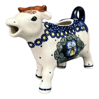 A picture of a Polish Pottery Cow Creamer (Pansies) | D081S-JZB as shown at PolishPotteryOutlet.com/products/cow-creamer-pansies-d081s-jzb