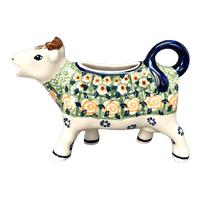A picture of a Polish Pottery Cow Creamer (Perennial Garden) | D081S-LM as shown at PolishPotteryOutlet.com/products/cow-creamer-perennial-garden-d081s-lm
