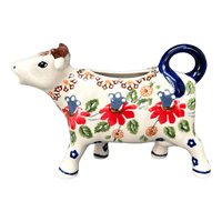 A picture of a Polish Pottery Cow Creamer (Mediterranean Blossoms) | D081S-P274 as shown at PolishPotteryOutlet.com/products/cow-creamer-mediterranean-blossoms-d081s-p274