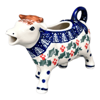 A picture of a Polish Pottery Cow Creamer (Holiday Cheer) | D081T-NOS2 as shown at PolishPotteryOutlet.com/products/4-oz-cow-creamer-holiday-cheer-d081t-nos2