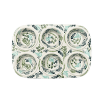 A picture of a Polish Pottery Muffin Pan (Scattered Ferns) | F093S-GZ39 as shown at PolishPotteryOutlet.com/products/muffin-pan-scattered-ferns-f093s-gz39