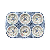 A picture of a Polish Pottery Muffin Pan (Wildflower Delight) | F093S-P273 as shown at PolishPotteryOutlet.com/products/12-5-x-8-5-muffin-pan-wildflower-delight-f093s-p273