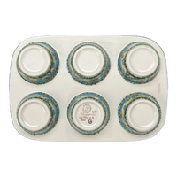 A picture of a Polish Pottery Muffin Pan (Butterflies in Flight) | F093S-WKM as shown at PolishPotteryOutlet.com/products/muffin-pan-butterflies-in-flight-f093s-wkm