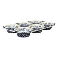 A picture of a Polish Pottery Muffin Pan (Lily of the Valley) | F093T-ASD as shown at PolishPotteryOutlet.com/products/muffin-pan-lily-of-the-valley-f093t-asd