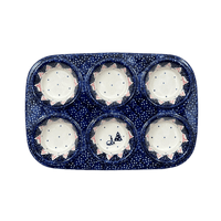 A picture of a Polish Pottery Muffin Pan (Christmas Chapel) | F093T-CHDK as shown at PolishPotteryOutlet.com/products/muffin-pan-christmas-chapel-f093t-chdk