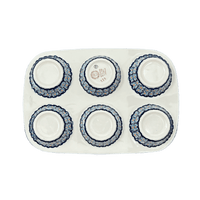 A picture of a Polish Pottery Muffin Pan (Blue Diamond) | F093U-DHR as shown at PolishPotteryOutlet.com/products/12-5-x-8-5-muffin-pan-blue-diamond-f093u-dhr