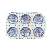 A picture of a Polish Pottery Muffin Pan (Snowflake Love) | F093U-PS01 as shown at PolishPotteryOutlet.com/products/muffin-pan-snowflake-love-f093u-ps01