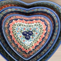 A picture of a Polish Pottery 8" X 8.75" Heart Bowl (Garden Breeze) | NDA368-A48 as shown at PolishPotteryOutlet.com/products/8-x-8-75-heart-bowl-garden-breeze-nda368-a48