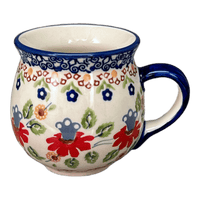 A picture of a Polish Pottery Small Belly Mug (Mediterranean Blossoms) | K067S-P274 as shown at PolishPotteryOutlet.com/products/7-oz-belly-mug-mediterranean-blossoms-k067s-p274