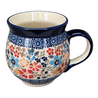 A picture of a Polish Pottery Large Belly Mug (Festive Flowers) | K068S-IZ16 as shown at PolishPotteryOutlet.com/products/large-belly-mug-festive-flowers-k068s-iz16