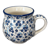 A picture of a Polish Pottery Medium Belly Mug (Scattered Blues) | K090S-AS45 as shown at PolishPotteryOutlet.com/products/the-medium-belly-mug-scattered-blues-k090s-as45