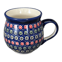 A picture of a Polish Pottery Medium Belly Mug (Rings of Flowers) | K090U-DH17 as shown at PolishPotteryOutlet.com/products/the-medium-belly-mug-rings-of-flowers-k090u-dh17