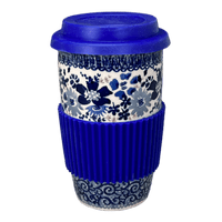 A picture of a Polish Pottery Travel Mug (Blue Life) | K115S-EO39 as shown at PolishPotteryOutlet.com/products/travel-mug-blue-life-k115s-eo39