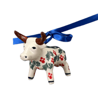 A picture of a Polish Pottery Bull Ornament (Holiday Cheer) | K167T-NOS2 as shown at PolishPotteryOutlet.com/products/bull-ornament-holiday-cheer-k167t-p249