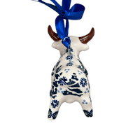 A picture of a Polish Pottery Bull Ornament (Snowy Pines) | K167T-U22 as shown at PolishPotteryOutlet.com/products/bull-ornament-snowy-pines-k167t-u22