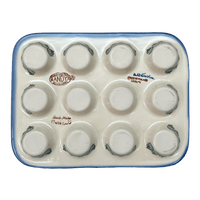 A picture of a Polish Pottery 12 Cup Mini Muffin Pan (Teal Pompons) | NDA169-62 as shown at PolishPotteryOutlet.com/products/11-5-x-8-75-mini-muffin-pan-teal-pompons-nda169-62