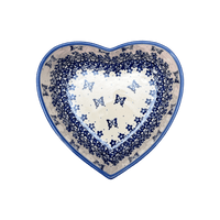 A picture of a Polish Pottery Bowl, Heart-Shaped 6.5" x 7" in "Butterfly Blues" by Andy | NDA367-17 as shown at PolishPotteryOutlet.com/products/6-5-x-7-heart-bowl-butterfly-blues-nda367-17