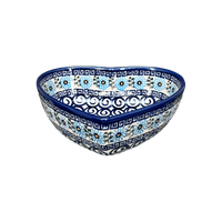 A picture of a Polish Pottery 6.5" x 7" Heart Bowl  (Blue Daisy Spiral) | NDA367-38 as shown at PolishPotteryOutlet.com/products/6-5-x-7-heart-bowl-blue-daisy-spiral-nda367-38