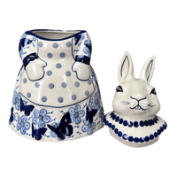 A picture of a Polish Pottery Rabbit Cookie Jar (Blue Butterfly) | P080U-AS58 as shown at PolishPotteryOutlet.com/products/rabbit-cookie-jar-blue-butterfly-p080u-as58