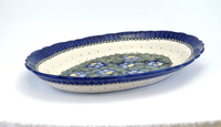 A picture of a Polish Pottery Large Scalloped Oval Platter (Pansies) | P165S-JZB as shown at PolishPotteryOutlet.com/products/large-scalloped-oval-plater-pansies-p165s-jzb