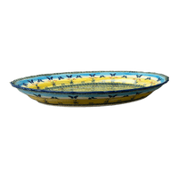 A picture of a Polish Pottery Large Scalloped Oval Platter (Butterflies in Flight) | P165S-WKM as shown at PolishPotteryOutlet.com/products/large-scalloped-oval-plater-butterflies-in-flight-p165s-wkm