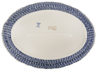 A picture of a Polish Pottery Large Scalloped Oval Platter (Brilliant Garden) | P165S-DPLW as shown at PolishPotteryOutlet.com/products/large-scalloped-oval-plater-brilliant-garden-p165s-dplw