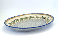 A picture of a Polish Pottery Large Scalloped Oval Platter (Ducks in a Row) | P165U-P323 as shown at PolishPotteryOutlet.com/products/16-75-x-12-25-large-scalloped-oval-platter-ducks-in-a-row-p165u-p323