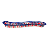 A picture of a Polish Pottery Curved Olive Boat (Pom-Pom Flower) | NDA132-30 as shown at PolishPotteryOutlet.com/products/curved-olive-boat-pom-pom-flower-nda132-30