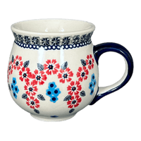 A picture of a Polish Pottery Medium Belly Mug (Floral Symmetry) | K090T-DH18 as shown at PolishPotteryOutlet.com/products/medium-belly-mug-floral-symmetry-k090t-dh18