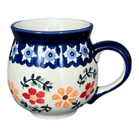 A picture of a Polish Pottery Medium Belly Mug (Star Garden) | K090U-JS72 as shown at PolishPotteryOutlet.com/products/10-oz-mug-star-garden-k090u-js72