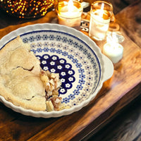 A picture of a Polish Pottery Pie Plate with Handles (Perennial Garden) | Z148S-LM as shown at PolishPotteryOutlet.com/products/pie-plate-with-handles-perennial-garden