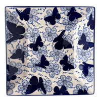 A picture of a Polish Pottery 7" Square Dessert Plate (Blue Butterfly) | T158U-AS58 as shown at PolishPotteryOutlet.com/products/7-square-dessert-plates-blue-butterfly-t158u-as58