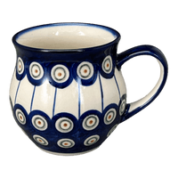 A picture of a Polish Pottery WR 12 oz. Belly Mug (Peacock in Line) | WR14M-SM1 as shown at PolishPotteryOutlet.com/products/12-oz-belly-mug-peacock-in-line-wr14m-sm1