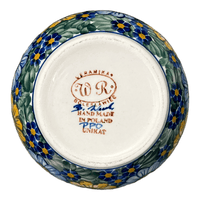 A picture of a Polish Pottery Round Covered Container (Bed of Blossoms) | WR31I-KG2 as shown at PolishPotteryOutlet.com/products/round-covered-container-bed-of-blossoms-wr31i-kg2