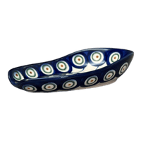A picture of a Polish Pottery 3.5" x 5" Spoon Rest (Peacock in Line) | WR55D-SM1 as shown at PolishPotteryOutlet.com/products/spoon-rest-peacock-in-line-wr55d-sm1
