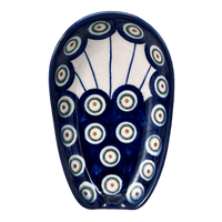 A picture of a Polish Pottery WR 3.5" x 5" Spoon Rest (Peacock in Line) | WR55D-SM1 as shown at PolishPotteryOutlet.com/products/spoon-rest-peacock-in-line-wr55d-sm1
