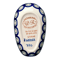A picture of a Polish Pottery 3.5" x 5" Spoon Rest (Peacock in Line) | WR55D-SM1 as shown at PolishPotteryOutlet.com/products/spoon-rest-peacock-in-line-wr55d-sm1