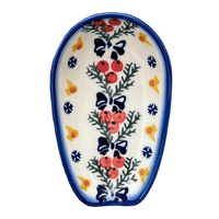 A picture of a Polish Pottery 3.5" x 5" Spoon Rest (Bows in Snow) | WR55D-WR15 as shown at PolishPotteryOutlet.com/products/3-5-x-5-spoon-rest-bows-in-snow-wr55d-wr15