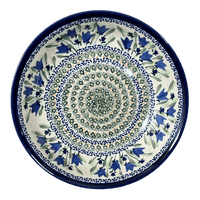 A picture of a Polish Pottery Zaklady 10" Shallow Serving Bowl (Blue Tulips) | Y1013A-ART160 as shown at PolishPotteryOutlet.com/products/shallow-10-serving-bowl-blue-tulips-y1013a-art160