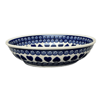A picture of a Polish Pottery Zaklady 10" Shallow Serving Bowl (Swirling Hearts) | Y1013A-D467 as shown at PolishPotteryOutlet.com/products/10-shallow-serving-bowl-swirling-hearts-y1013a-d467