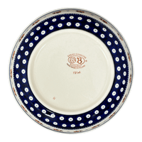 A picture of a Polish Pottery Zaklady 10" Shallow Serving Bowl (Persimmon Dot) | Y1013A-D479 as shown at PolishPotteryOutlet.com/products/shallow-10-serving-bowl-peacock-peaches-cream-y1013a-d479