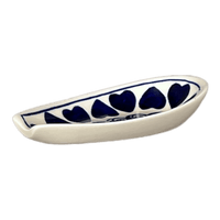 A picture of a Polish Pottery Zaklady 5" Spoon Rest (Swirling Hearts) | Y1015-D467 as shown at PolishPotteryOutlet.com/products/5-spoon-rest-swirling-hearts-y1015-d467