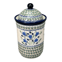 A picture of a Polish Pottery Zaklady 1 Liter Container (Blue Tulips) | Y1243-ART160 as shown at PolishPotteryOutlet.com/products/1l-container-blue-tulips-y1243-art160