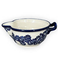 A picture of a Polish Pottery Zaklady 1.25 Quart Mixing Bowl (Blue Floral Vines) | Y1252-D1210A as shown at PolishPotteryOutlet.com/products/1-25-quart-mixing-bowl-blue-floral-vines-y1252-d1210a