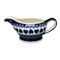 A picture of a Polish Pottery Zaklady 16 oz. Gravy Boat (Swirling Hearts) | Y1258-D467 as shown at PolishPotteryOutlet.com/products/16-oz-gravy-boat-swirling-hearts-y1258-d467