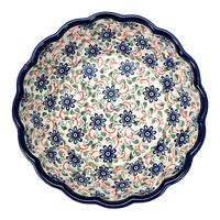 A picture of a Polish Pottery Zaklady Deep 9.5" Scalloped Bowl (Swirling Flowers) | Y1279A-A1197A as shown at PolishPotteryOutlet.com/products/scalloped-9-5-bowl-swirling-flowers-y1279a-a1197a