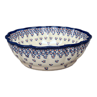 A picture of a Polish Pottery Zaklady Deep 9.5" Scalloped Bowl (Falling Blue Daisies) | Y1279A-A882A as shown at PolishPotteryOutlet.com/products/deep-9-5-scalloped-bowl-falling-blue-daisies-y1279a-a882a